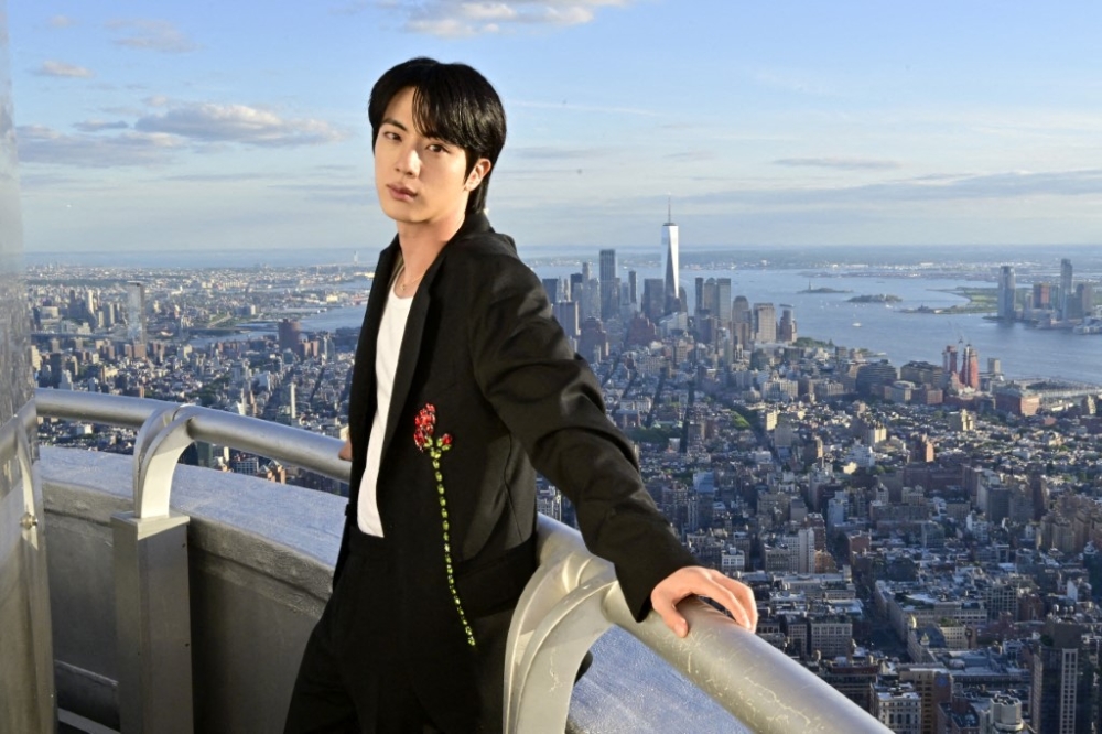 Japanese fan charged with sexual harassment for planting unwanted kiss on BTS’ Jin at fan meet