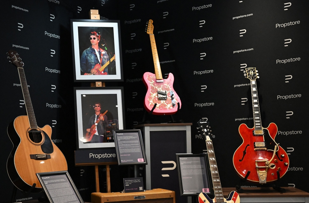 Noel Gallagher’s Oasis guitar smashed by brother Liam among £3m music memorabilia up for auction in London