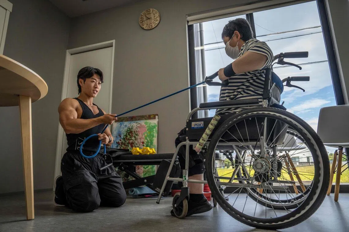 Young bodybuilders lift Japan’s ailing care sector
