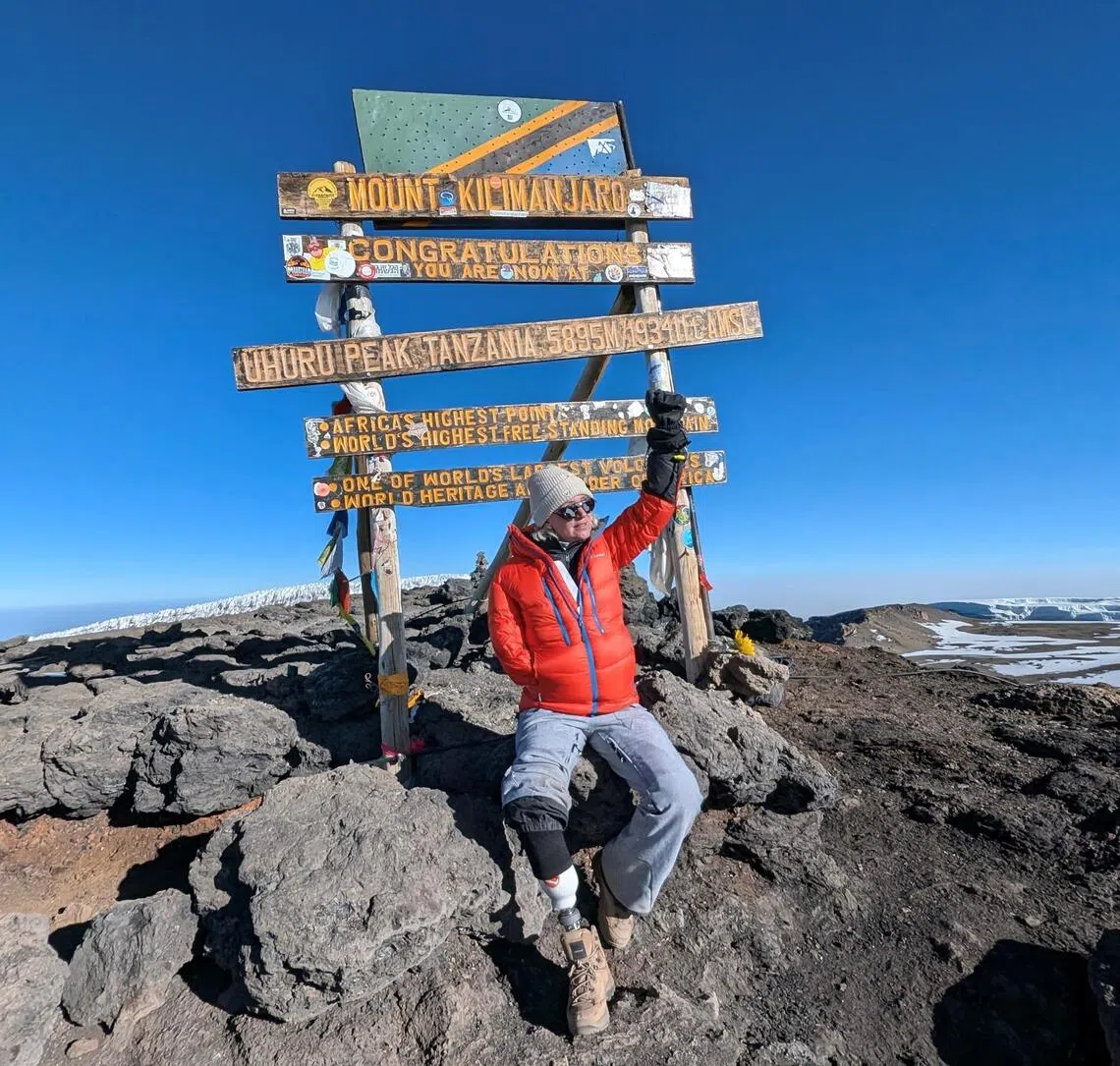 After losing two limbs in London train accident, she conquers Mount Kilimanjaro