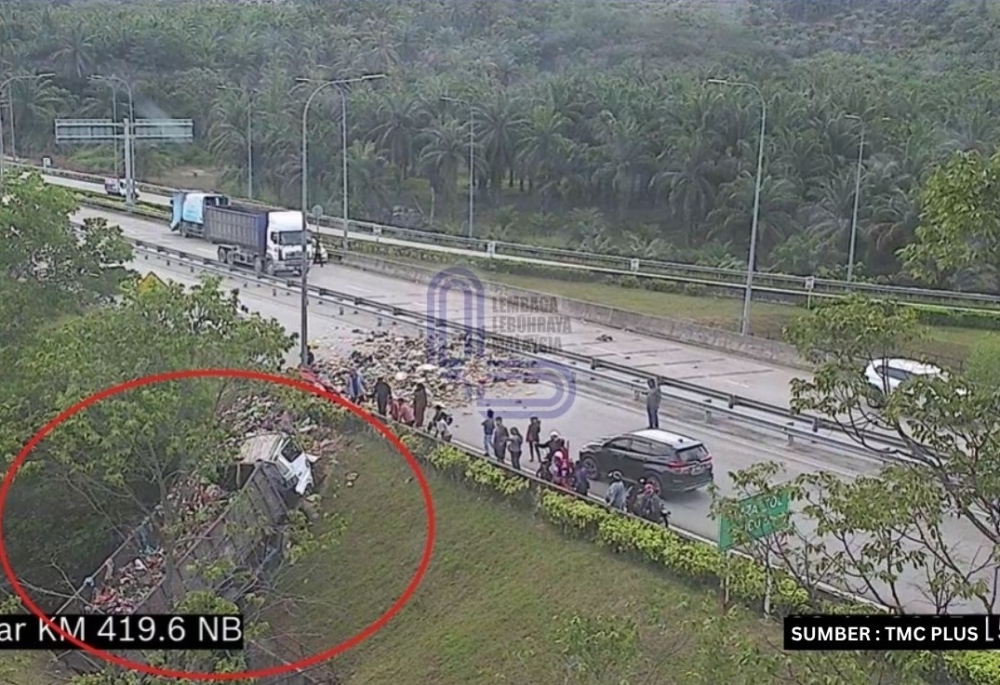 Rubbish truck driver breaks leg after vehicle skids off PLUS highway near Bukit Tagar