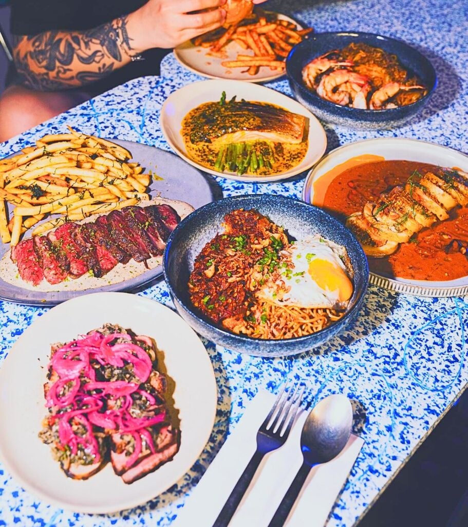 Naga House Bistro is your one-stop for Japanese-Western fusion dishes, quirky cocktails, streetwear merchandise, and more