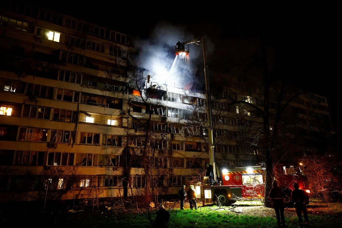 Russian drones trigger fires in Kyiv dwellings, killing one, officials say