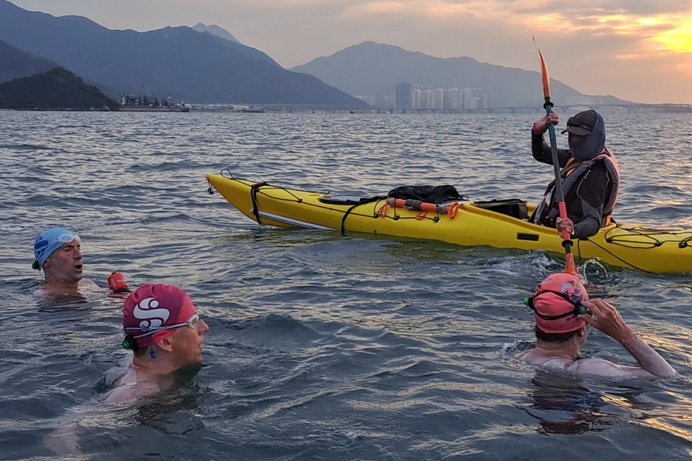 Delirium, painkillers: Swimmers conquer Hong Kong seas over 21 hours