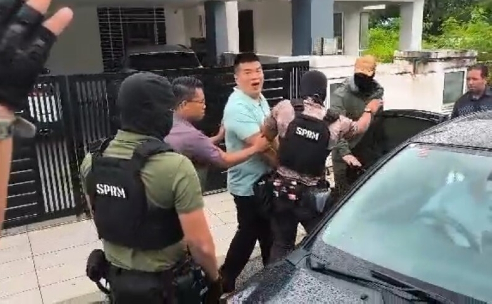 Albert Tei arrested by armed MACC officers after raid on home, lawyer says due process ignored