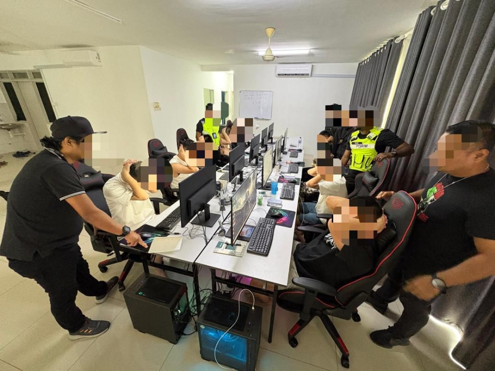 Cops bust eight online scam rings in KL, arrest 52 foreign nationals and five locals