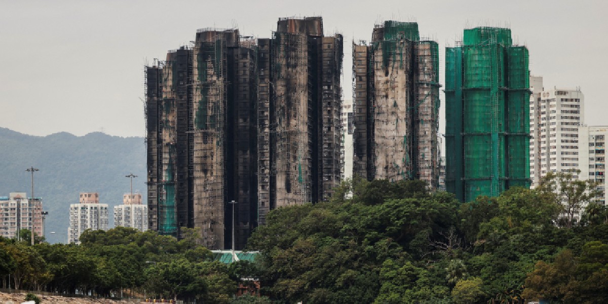 Hong Kong fire: Echoes of loss below burnt towers