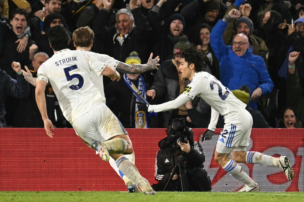 Liverpool’s title defence in tatters after another late collapse at Leeds