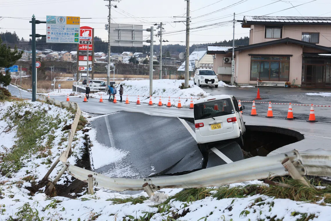 51 hurt in Japan quake as warning persists