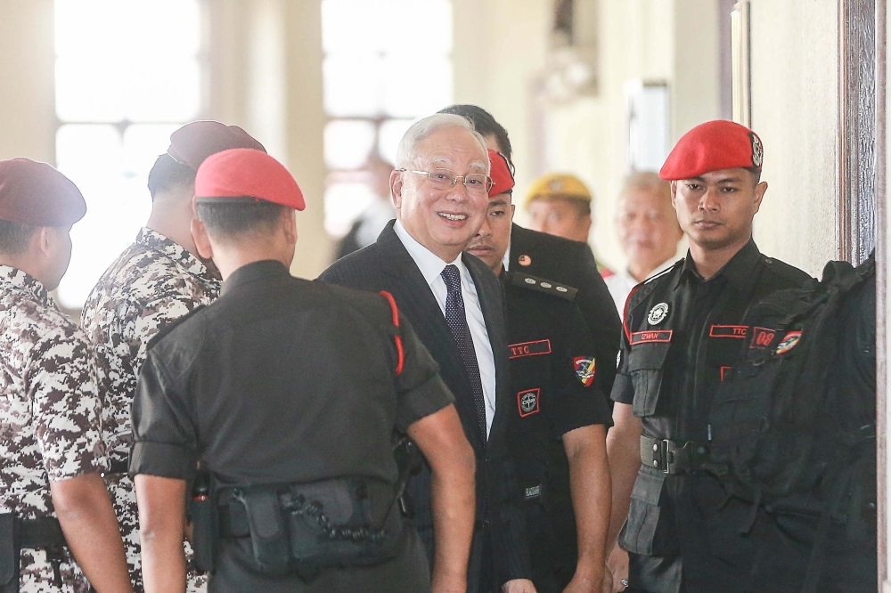 Ex-PM Najib gets concurrent 15-year jail terms, RM11.38b fine over 1MDB scandal