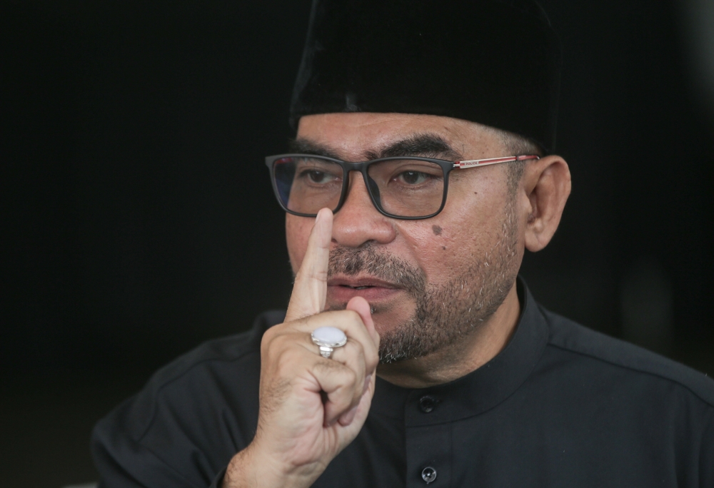 Mujahid settles defamation suit against PAS after three years