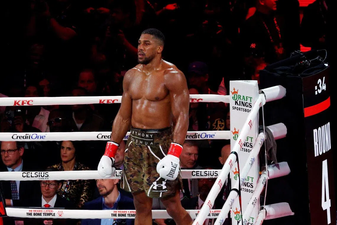 Boxer Anthony Joshua stable after fatal car crash in Nigeria that killed his two friends