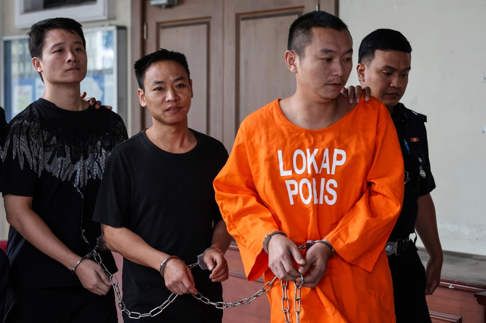 Three Chinese nationals charged in Penang with trafficking 26kg of meth, face death penalty