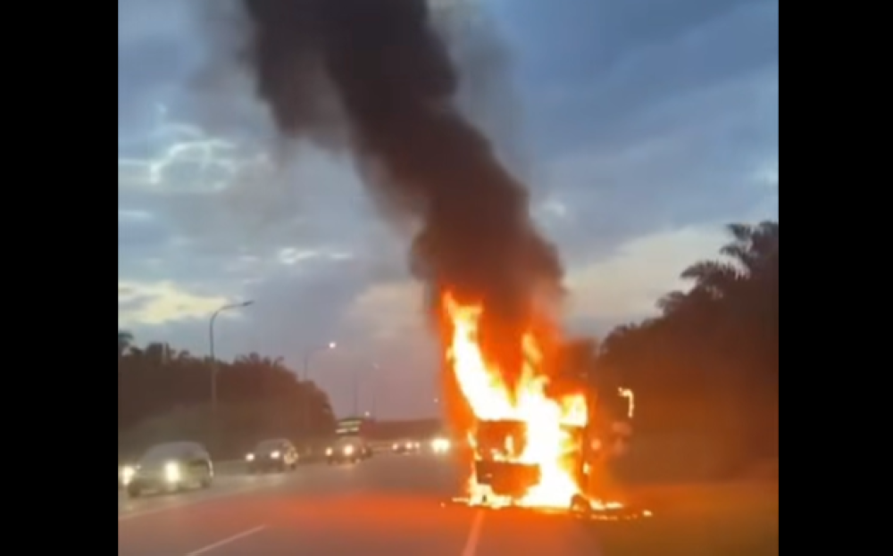 Fiery Segamat crash claims life of motorcyclist trapped under lorry