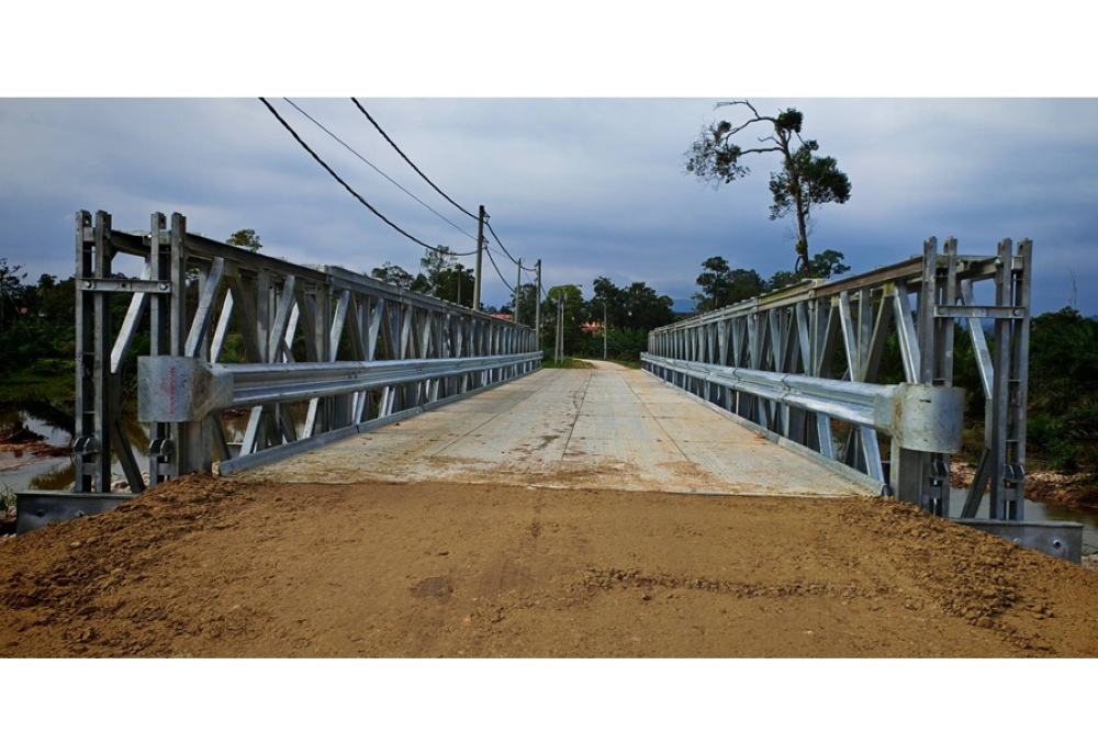 JKR completes Bailey bridge at Sungai Mok after collapse caused by heavy rain, route reopens to traffic