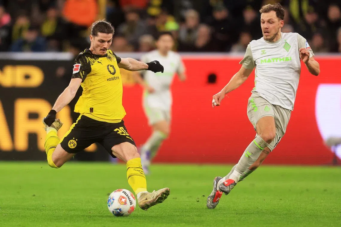 Dortmund ease past Werder 3-0 to stretch unbeaten run
