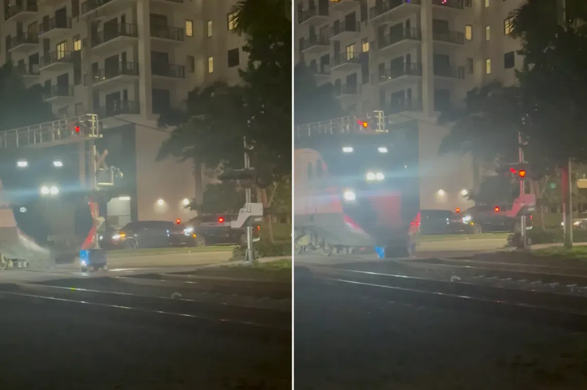 Uber Eats delivery robot stuck on track loses high-speed stand-off with train in Miami