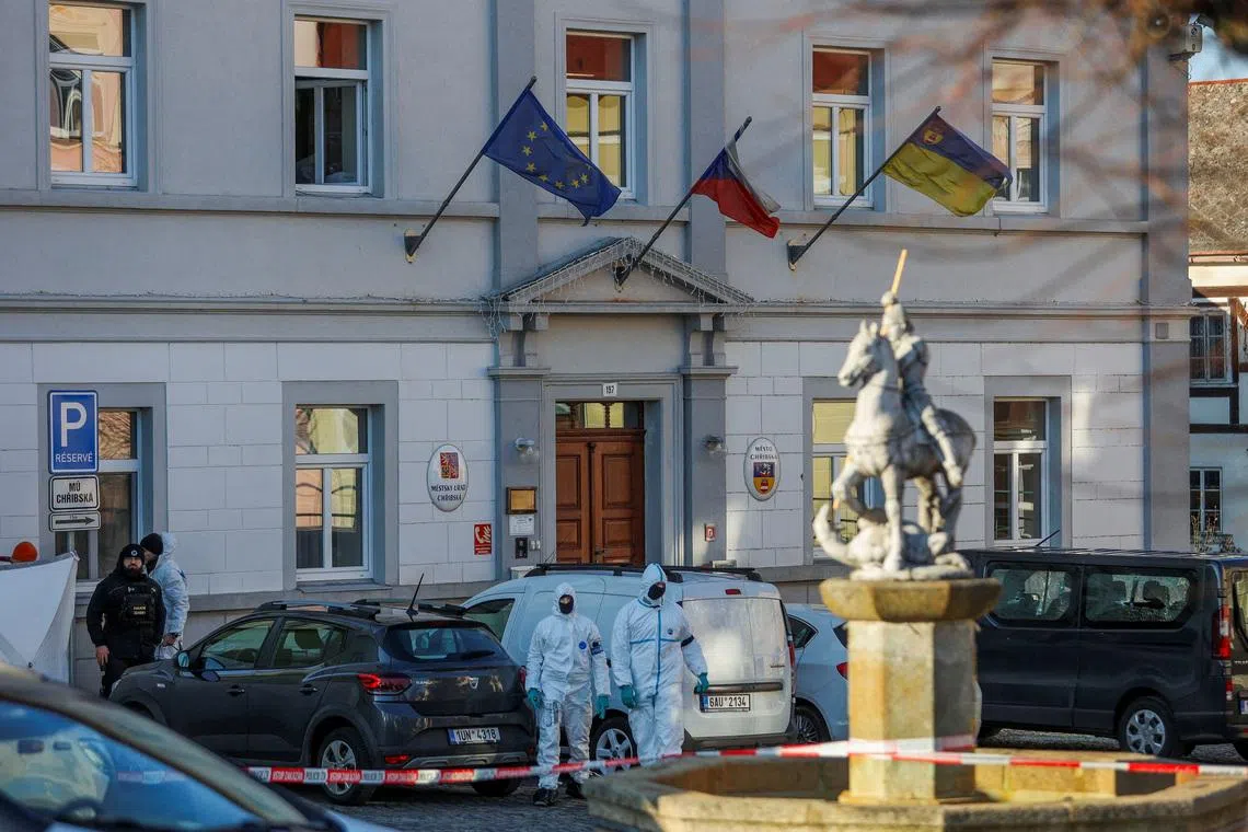 Gunman kills one, wounds six others in Czech town hall before killing self
