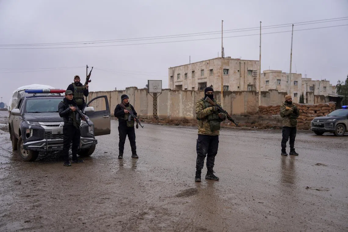 Syrian troops, Kurdish forces poised on front lines as truce deadline looms