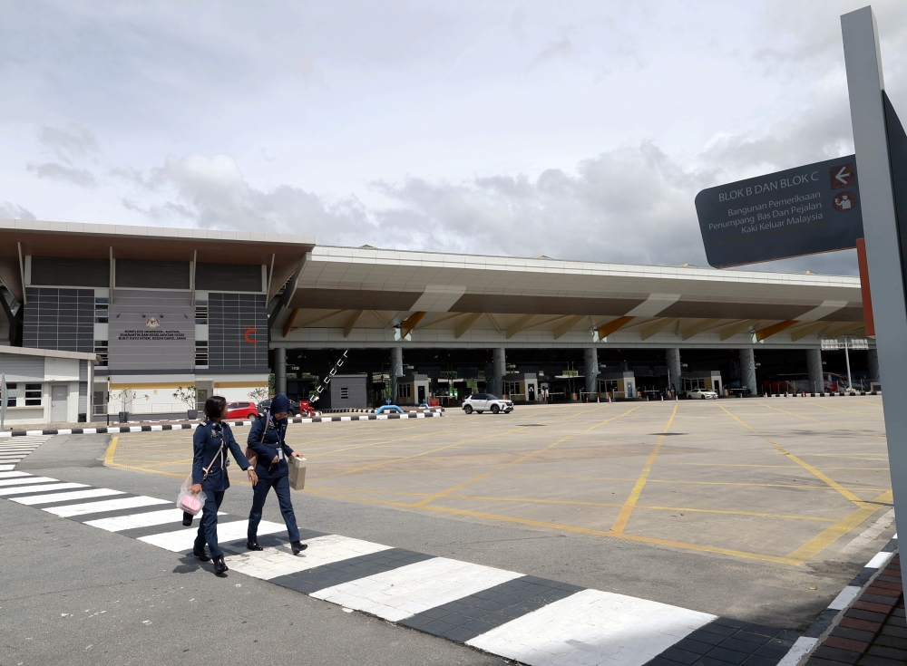 Immigration vows tough action against ‘duit kopi’ bribery at border crossings, warns of national security risks