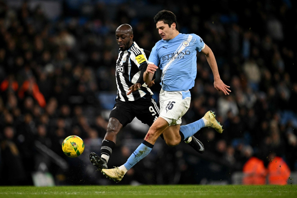 Man City storm past Newcastle to set up League Cup final with Arsenal