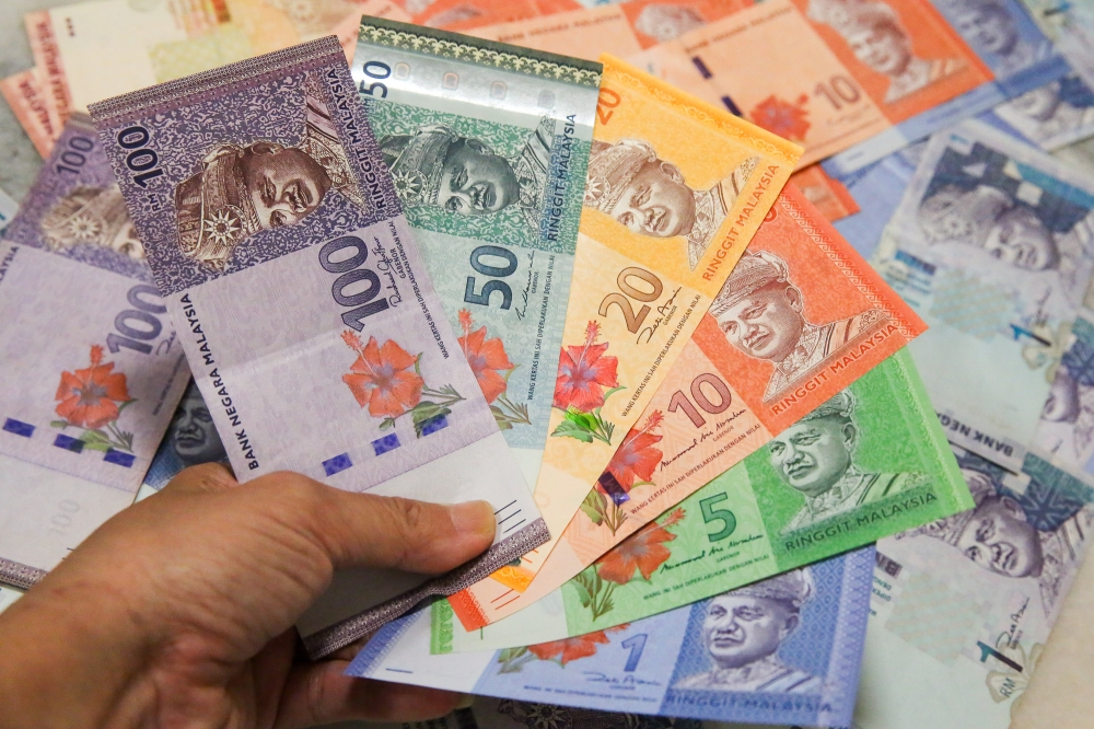 Ringgit opens firmer against US dollar on weaker greenback