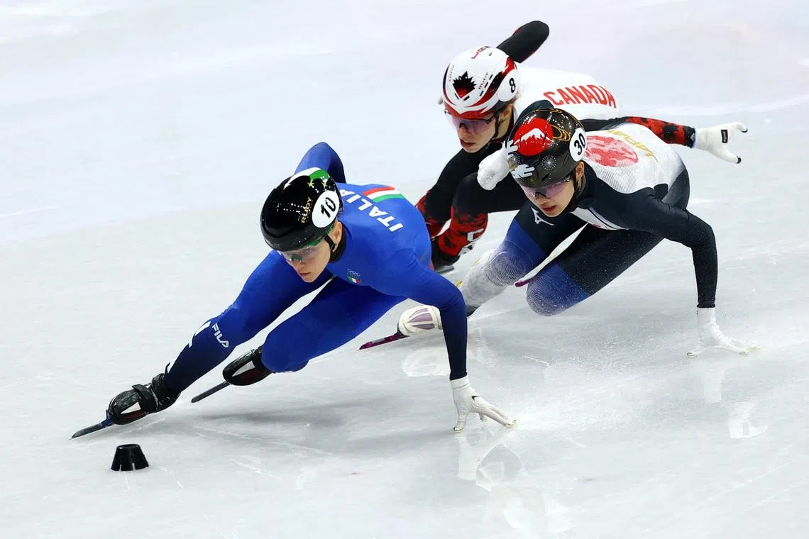Short track-Italy's Fontana edges closer to historic 14th medal