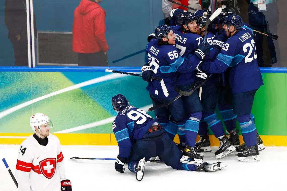 Ice hockey-Reigning champions Finland make dramatic quarter-final comeback to beat Swiss in overtime