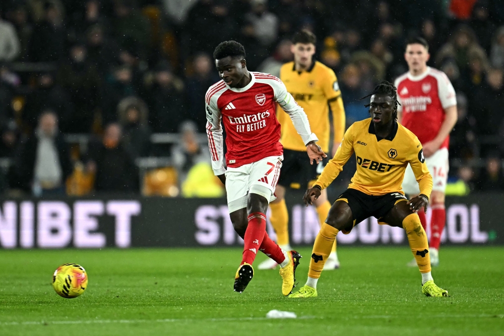 Arsenal squander two-goal lead as Wolves snatch stoppage-time draw