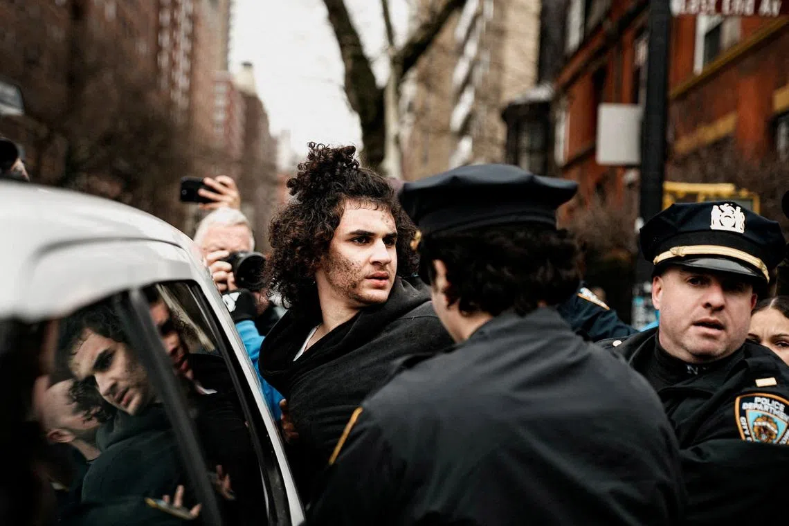 Two men charged with terrorism after homemade bomb thrown at anti-Islam protesters in New York