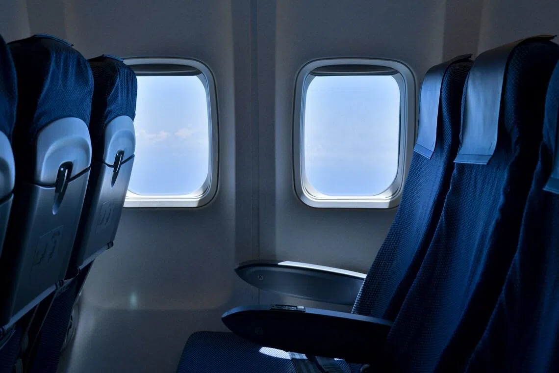 Man to be charged after allegedly stealing from passenger on flight from Singapore to Jakarta