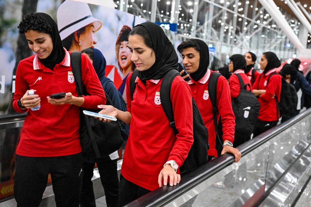 Iranian women’s football player in Australia reverses asylum claim after talking with teammates