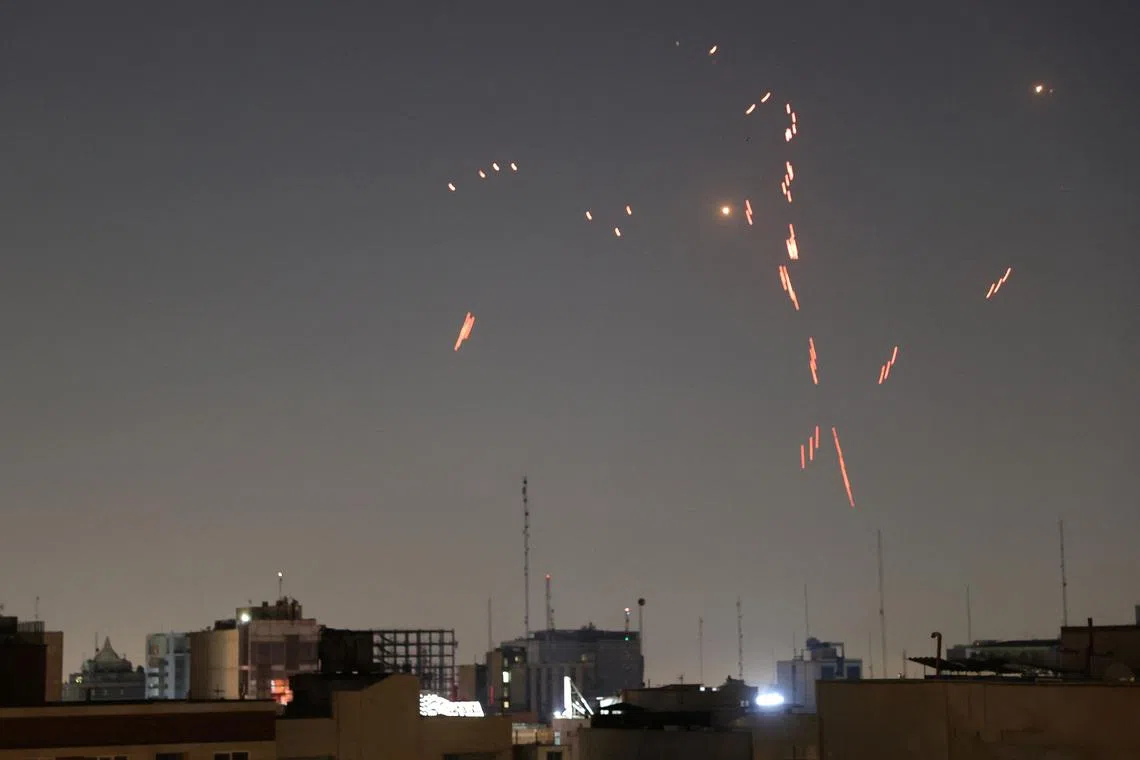 Israel says Iran is firing cluster warheads aimed at civilians