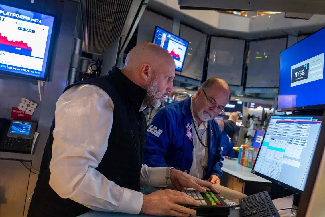 Wall Street ends down as traders see no rate cuts before 2027