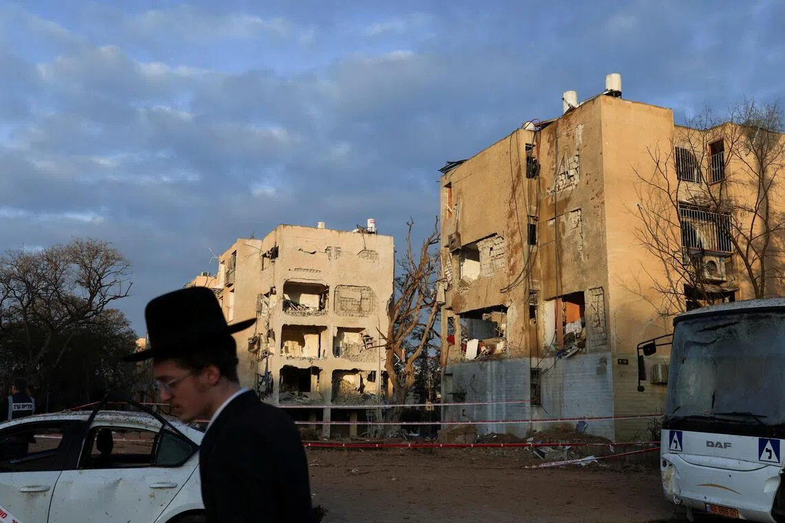 ‘Never seen anything like this’: Iranian missiles sow panic, destruction in Israeli towns